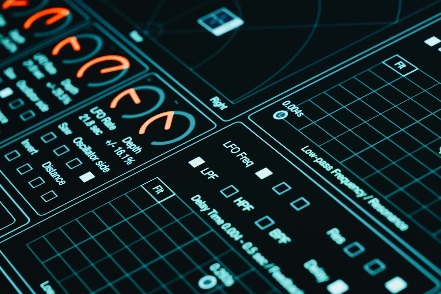 Digital audio interface screen with cyan and orange controls.